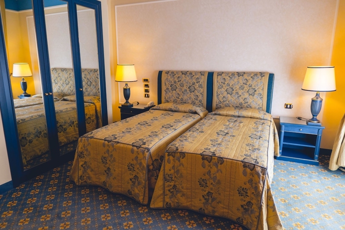 Imagen de la habitación del Hotel Altafiumara Resort and Spa. Foto 6