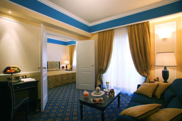 Imagen de la habitación del Hotel Altafiumara Resort and Spa. Foto 7