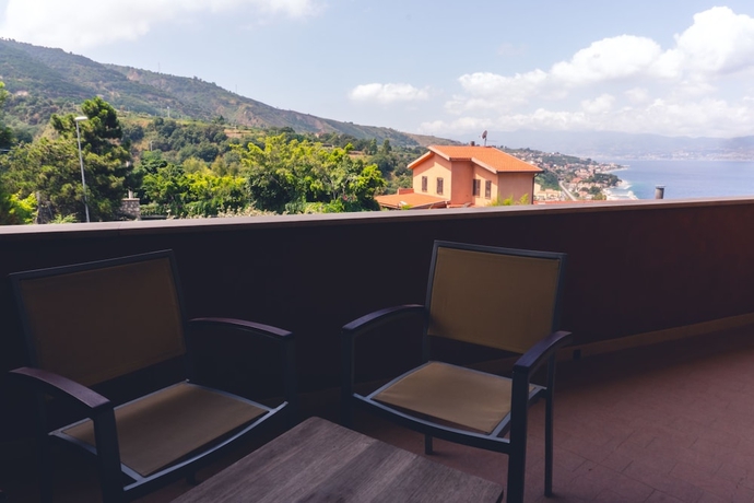 Imagen de la habitación del Hotel Altafiumara Resort and Spa. Foto 13