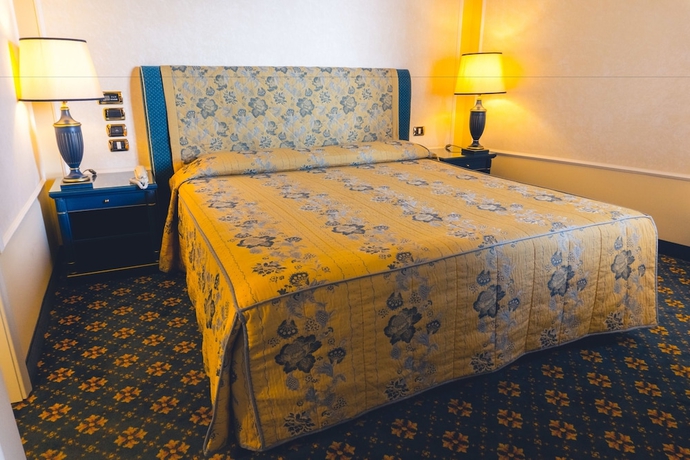 Imagen de la habitación del Hotel Altafiumara Resort and Spa. Foto 15