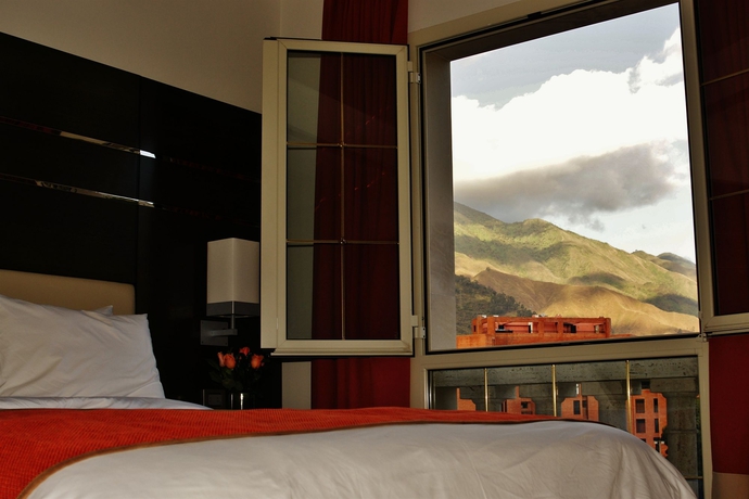 Imagen de la habitación del Hotel Altamira Village and Suites. Foto 4