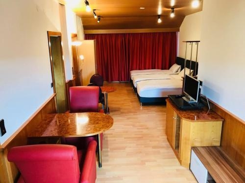 Imagen de la habitación del Hotel Altbacher Hof. Foto 9