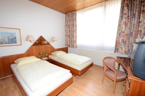 Imagen de la habitación del Hotel Altbacher Hof. Foto 10