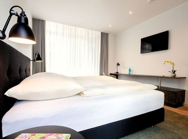 Imagen de la habitación del Hotel Altes Stadthaus. Foto 18