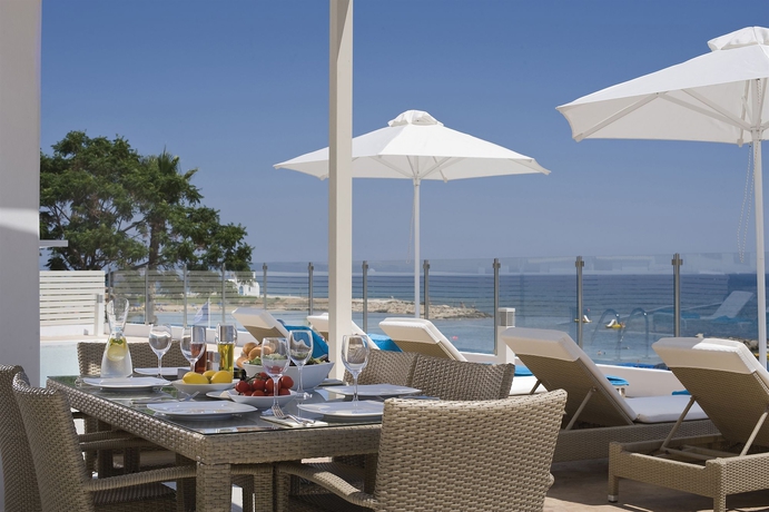 Imagen del bar/restaurante del Hotel Althea Kalamies Luxury Villas. Foto 4