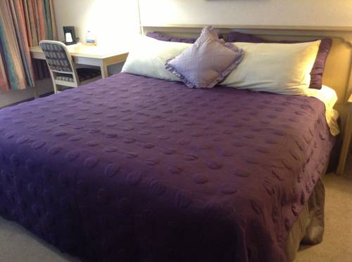 Imagen de la habitación del Hotel Altissimo Boutic Rigaud. Foto 15