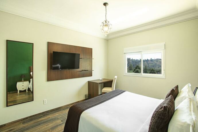 Imagen de la habitación del Hotel Altitude Lodge. Foto 16