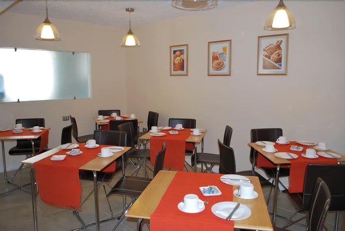 Imagen del bar/restaurante del Hotel Alto Del Sol Angamos Antofagasta. Foto 2