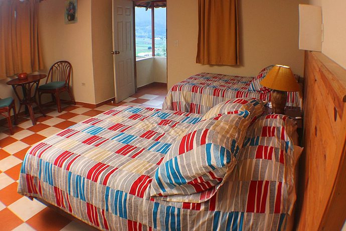 Imagen de la habitación del Hotel Altocerro Villas and Camping. Foto 5