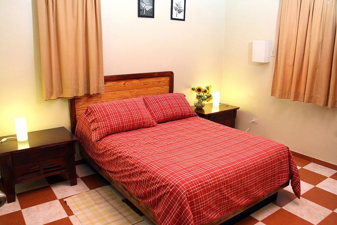 Imagen de la habitación del Hotel Altocerro Villas and Camping. Foto 7