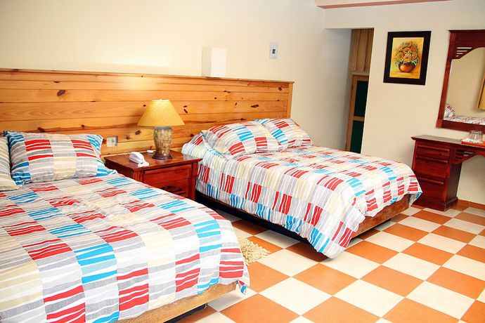Imagen de la habitación del Hotel Altocerro Villas and Camping. Foto 11
