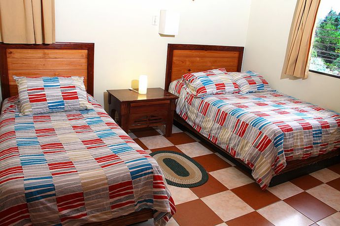 Imagen de la habitación del Hotel Altocerro Villas and Camping. Foto 12
