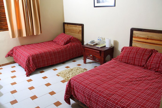 Imagen de la habitación del Hotel Altocerro Villas and Camping. Foto 14