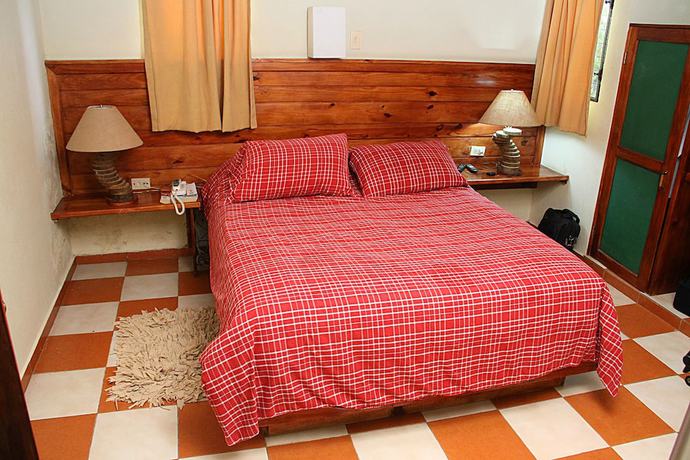 Imagen de la habitación del Hotel Altocerro Villas and Camping. Foto 18