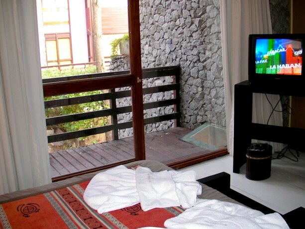 Imagen de la habitación del Hotel Altos Medanos - Cabañas Y Club De Bosque. Foto 27