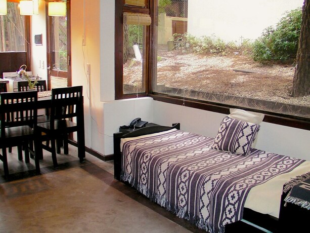 Imagen de la habitación del Hotel Altos Medanos - Cabañas Y Club De Bosque. Foto 29