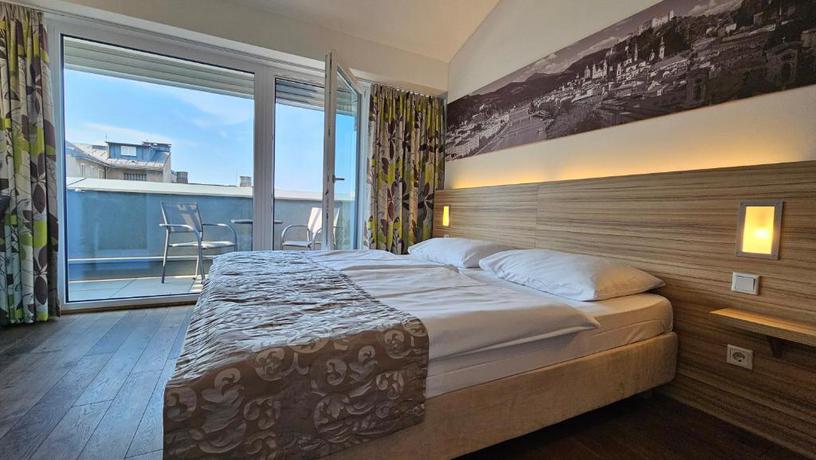 Imagen de la habitación del Hotel Altstadt Hofwirt Salzburg. Foto 7