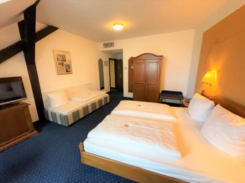 Imagen de la habitación del Hotel Altstadthotel Arch. Foto 20