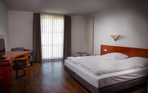 Imagen de la habitación del Hotel Altstadthotel Brauereigasthof Winkler. Foto 5