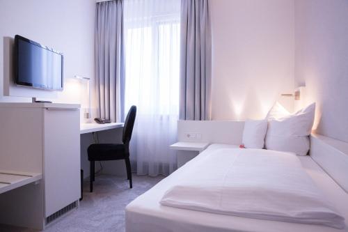 Imagen de la habitación del Hotel Altstadthotel. Foto 10