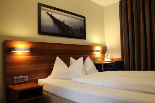 Imagen de la habitación del Hotel Altstadthotel Kneitinger, Abensberg. Foto 7