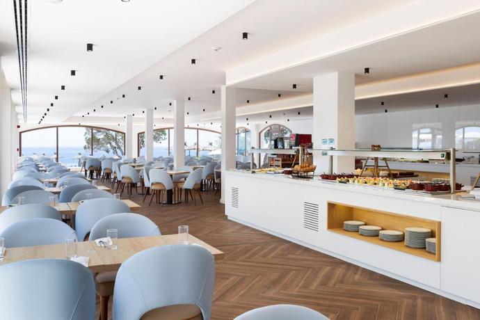 Imagen del bar/restaurante del Hotel Alua Suites Las Rocas. Foto 4