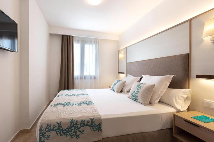 Imagen de la habitación del Hotel Alua Suites Las Rocas. Foto 12