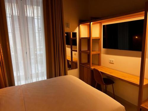 Imagen de la habitación del Hotel Alux Boutique. Foto 10