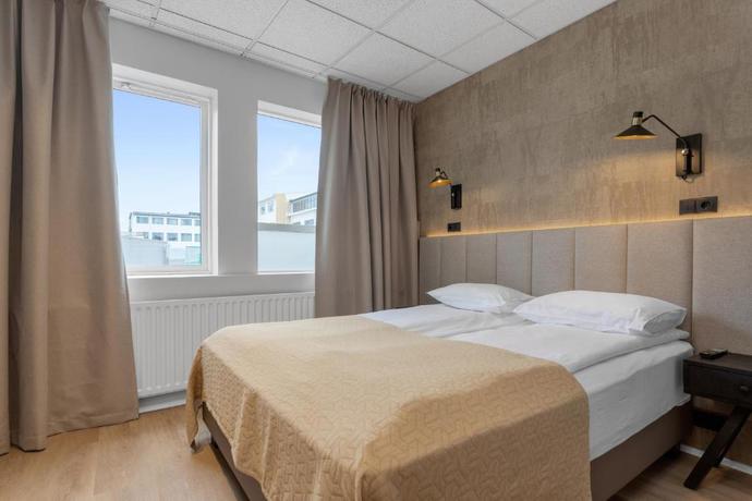 Imagen de la habitación del Hotel Alva Brautarholt. Foto 11