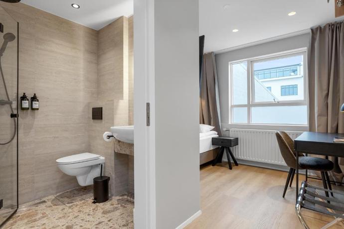 Imagen de la habitación del Hotel Alva Brautarholt. Foto 14