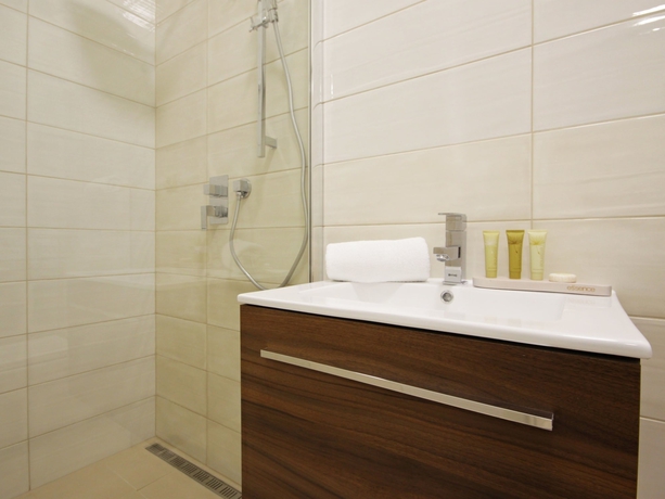 Imagen de la habitación del Hotel Alveo Suites. Foto 6