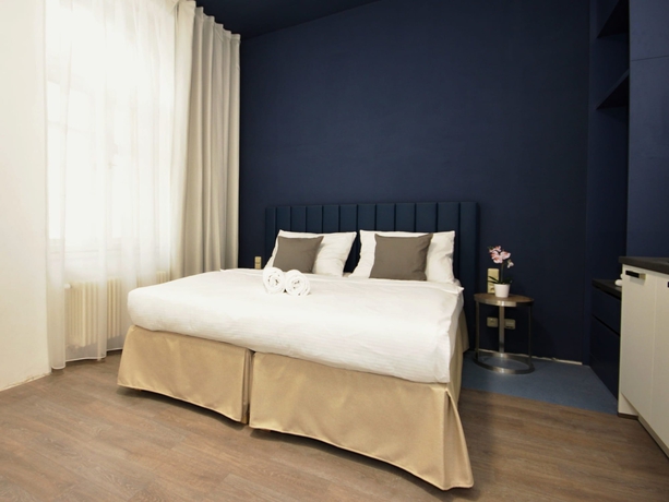 Imagen de la habitación del Hotel Alveo Suites. Foto 8