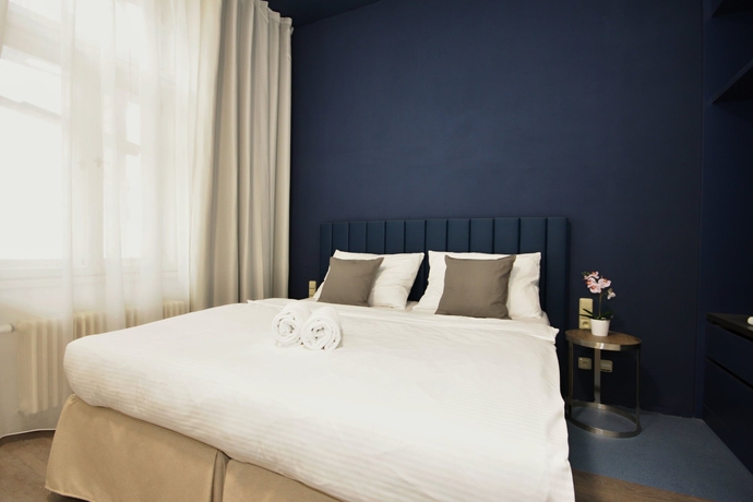 Imagen de la habitación del Hotel Alveo Suites. Foto 10