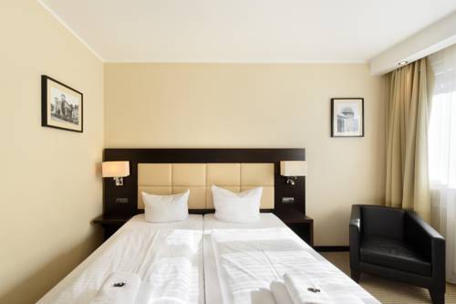 Imagen de la habitación del Hotel Am Karlstor. Foto 7