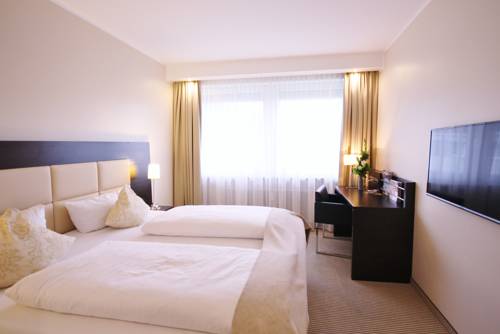 Imagen de la habitación del Hotel Am Karlstor. Foto 8