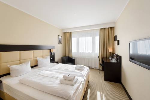 Imagen de la habitación del Hotel Am Karlstor. Foto 11