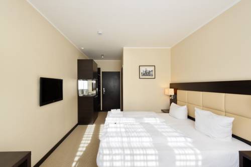 Imagen de la habitación del Hotel Am Karlstor. Foto 12