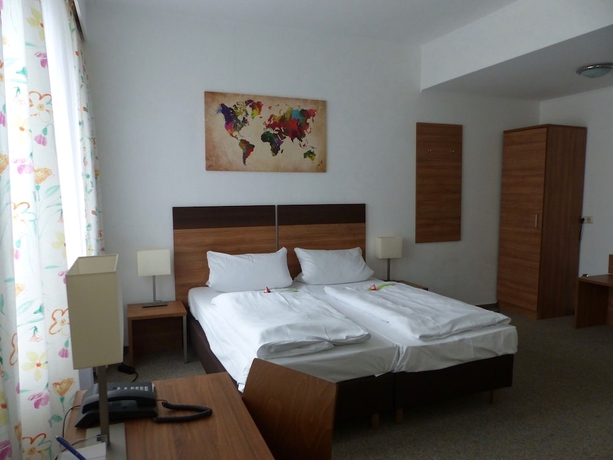 Imagen de la habitación del Hotel Am Ludwigsplatz. Foto 10