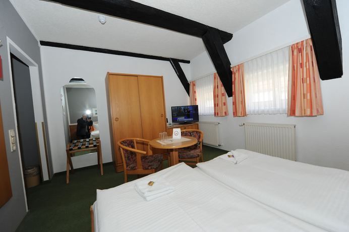 Imagen de la habitación del Hotel Am Markt and Brauhaus Stadtkrug. Foto 13