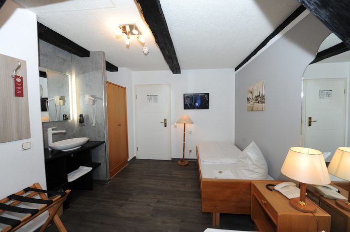 Imagen de la habitación del Hotel Am Markt and Brauhaus Stadtkrug. Foto 17