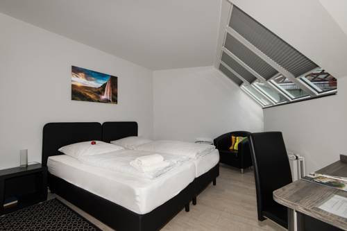 Imagen de la habitación del Hotel Am Nikolaiort. Foto 6
