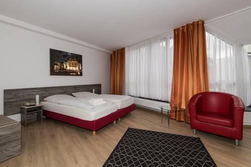 Imagen de la habitación del Hotel Am Nikolaiort. Foto 9