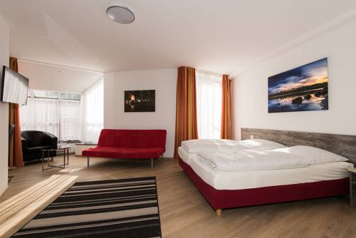 Imagen de la habitación del Hotel Am Nikolaiort. Foto 12