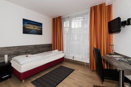Imagen de la habitación del Hotel Am Nikolaiort. Foto 13