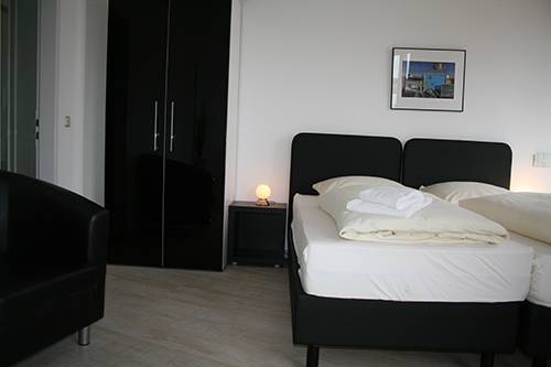 Imagen de la habitación del Hotel Am Nikolaiort. Foto 16