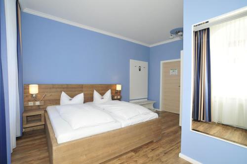 Imagen de la habitación del Hotel Am Obermarkt. Foto 6