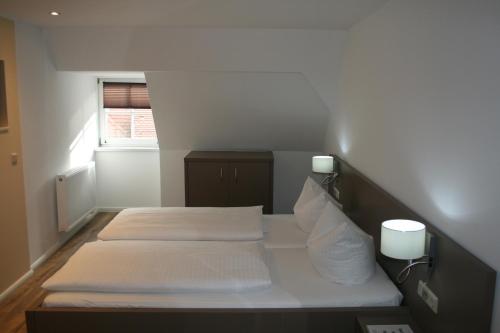 Imagen de la habitación del Hotel Am Obermarkt. Foto 9