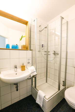 Imagen de la habitación del Hotel Am Peterstor. Foto 9