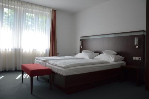 Imagen de la habitación del Hotel Am R&ouml;merwall. Foto 9