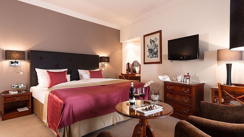 Imagen de la habitación del Hotel Am Schlossgarten. Foto 11